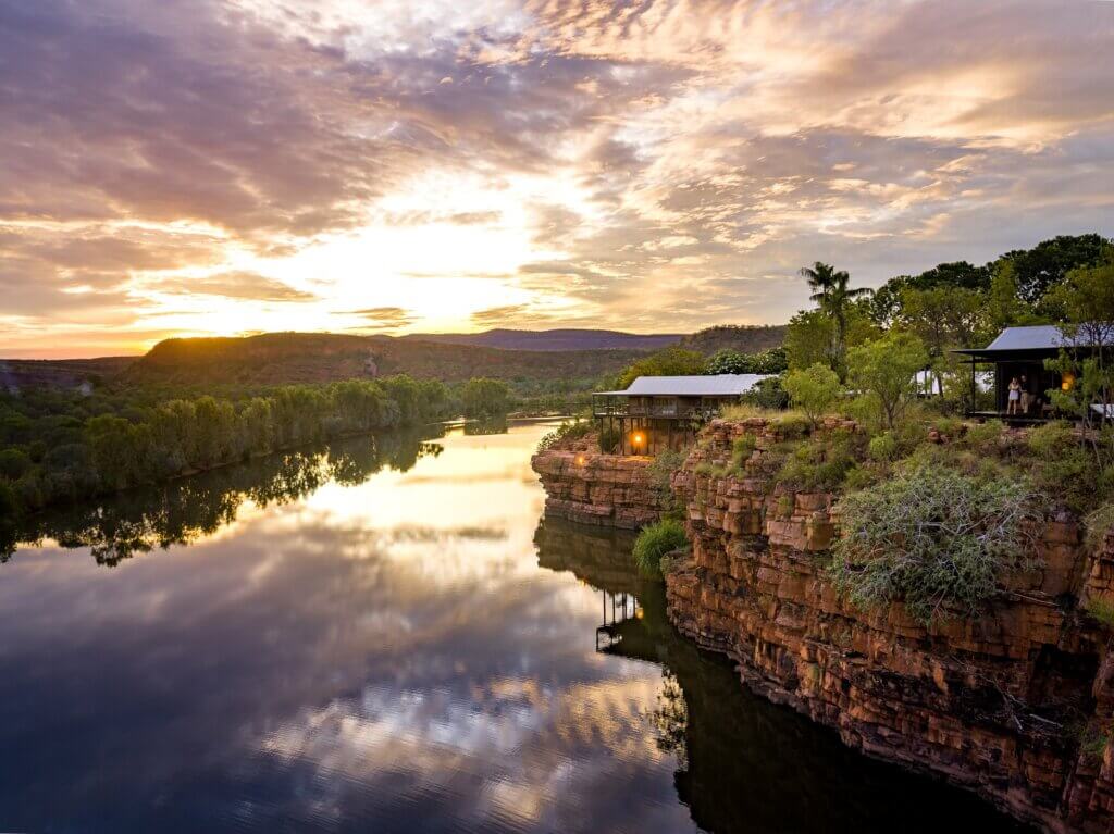 The El Questro Homestead is a luxurious retreat perched on a clifftop overlooking the Chamberlain River.